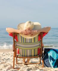 Woman relaxing on the beach in Alabama