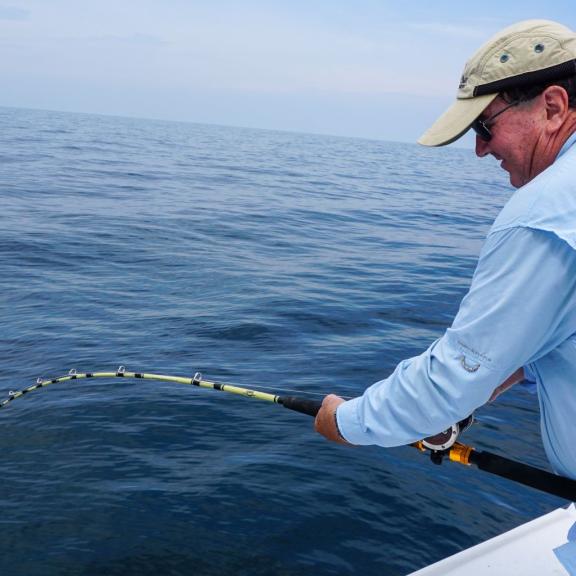 Angler on a fishing charter in Orange Beach 