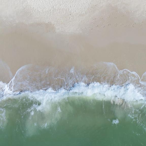 Waves crashing onto the shore of Gulf Shores beach