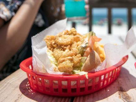 Pink Pony Pub Shrimp Po'boy lunch on the beach