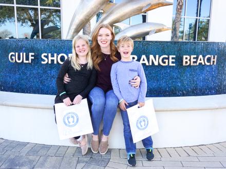Family at the Welcome Center in Gulf Shores, Alabama