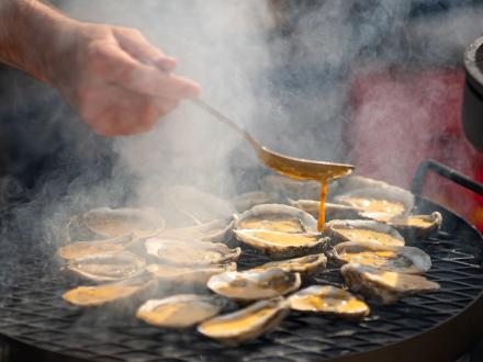 Oysters on the grill at a local seafood festival in Gulf Shores