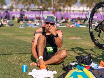 Triathlon runner taking a break before the bike portion
