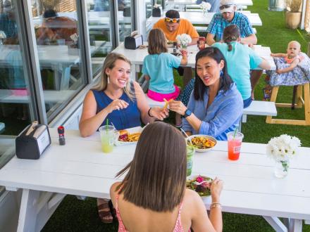 Women dining at Picnic Beach Restaurant in Gulf Shores