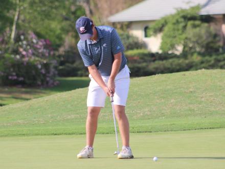 Golfer putting at Craft Farms Golf Resort in Gulf Shores