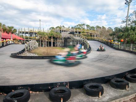 Go-karts racing at The Track Family Fun Park in Gulf Shores