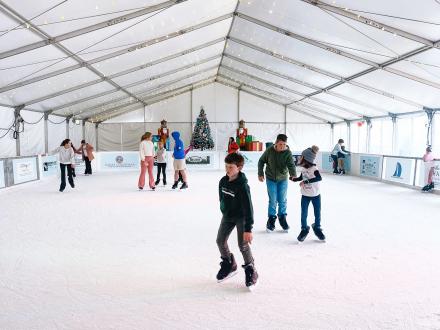 People ice skating at The Wharf during December in Orange Beach