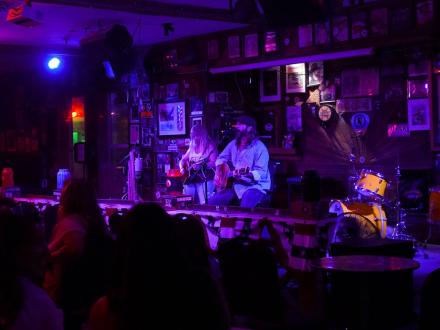 Band performing on a stage at Flora-Bama Lounge & Oyster Bar
